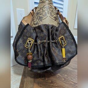 Louis Vuitton LV Monogram Kalahari GM shoulder bag.